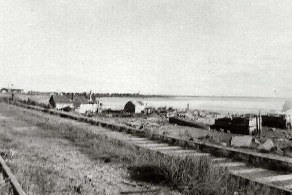 church_natives_shacks.jpg