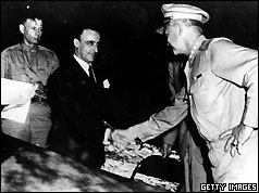 General G Castellano, representing Italy, receives a handshake from General Dwight D Eisenhower