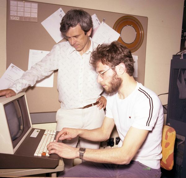 Peter Kent helps a Wantage student