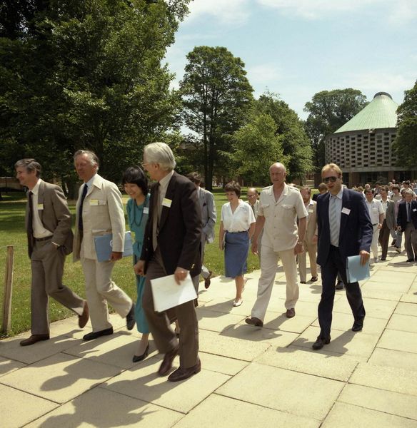 Alvey Conference, Sussex: Cliff Pavelin talks to Geoffrey Pattie, Rob Morland, Alvey VLSI Director looks on, July 1986