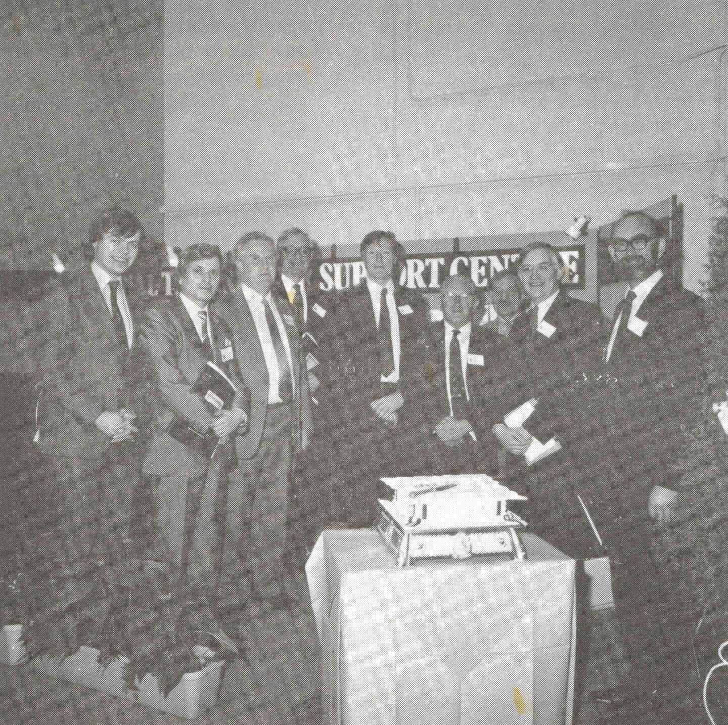From left to right: Cllr. C Betts (Leader of Sheffield City Council), Mr I Draffan (Dept. of Computer Studies, Sheffield City Polytechnic), Dr M R Jane (Transputer Initiative Co-ordinator), Dr A Catterall (Secretary of Science & Engineering Research Council), Mr J Stoddart (Head of Sheffield City Polytechnic), Prof. G D Sims (Vice Chancellor of Sheffield University), Prof. D Lewin (Director of National Transputer Support Centre), Mr R Jackson (MP for Wantage and Minister for Higher Education and Science), Dr P R Williams (Director of Rutherford Appleton Laboratory).