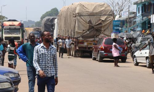  Traders and trucks in Elubo town, the main crossing point between Ghana and Côte d'Ivoire.