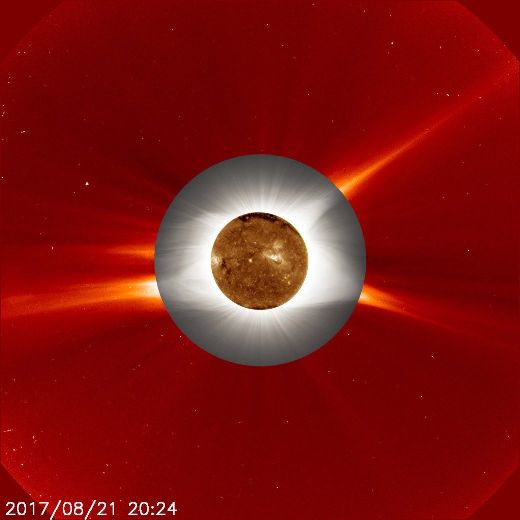 The Sun and its atmosphere, shown in a red, gray, and gold layers taken by NASA spacecraft