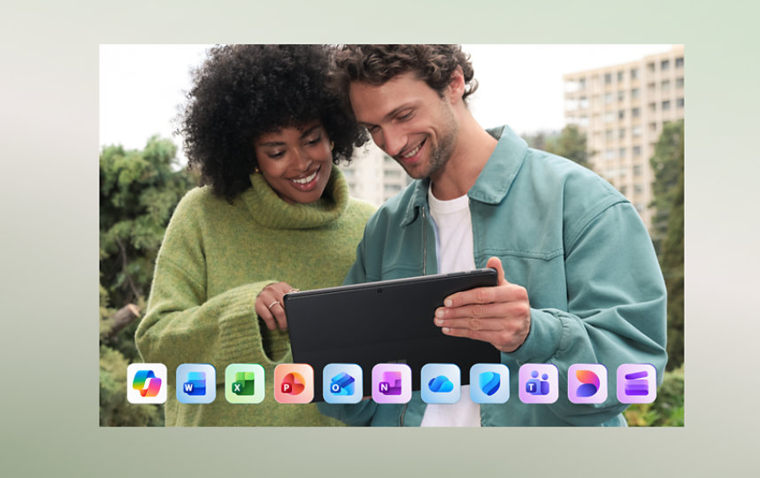 Two people use a Surface Pro outdoors with a row of Microsoft 365 apps listed at the bottom, such as: Microsoft Copilot, Word, Excel, PowerPoint, Outlook, OneNote, OneDrive, Microsoft Defender, Microsoft Teams, Microsoft Designer, and Clipchamp.