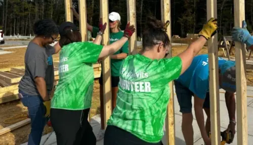 RxBenefit employees help build a home with Habitat for Humanity