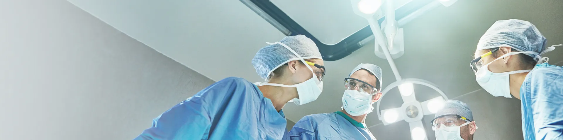 Hospital, surgery and team of doctors in operation for emergency crisis, medical service and procedure.