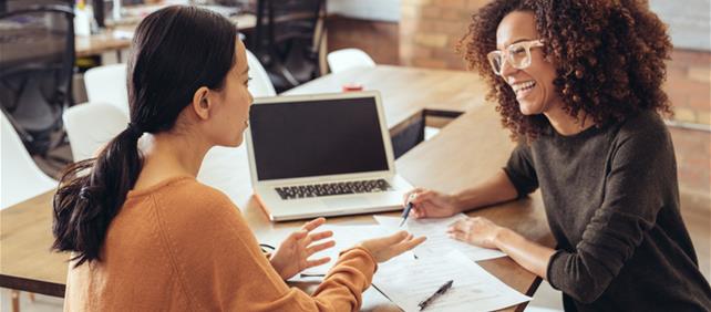 Financial advisor engaging with credit union member
