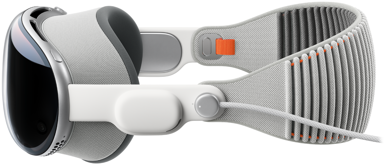 Apple&nbsp;Vision&nbsp;Pro 的侧视图，显示电池已连接。