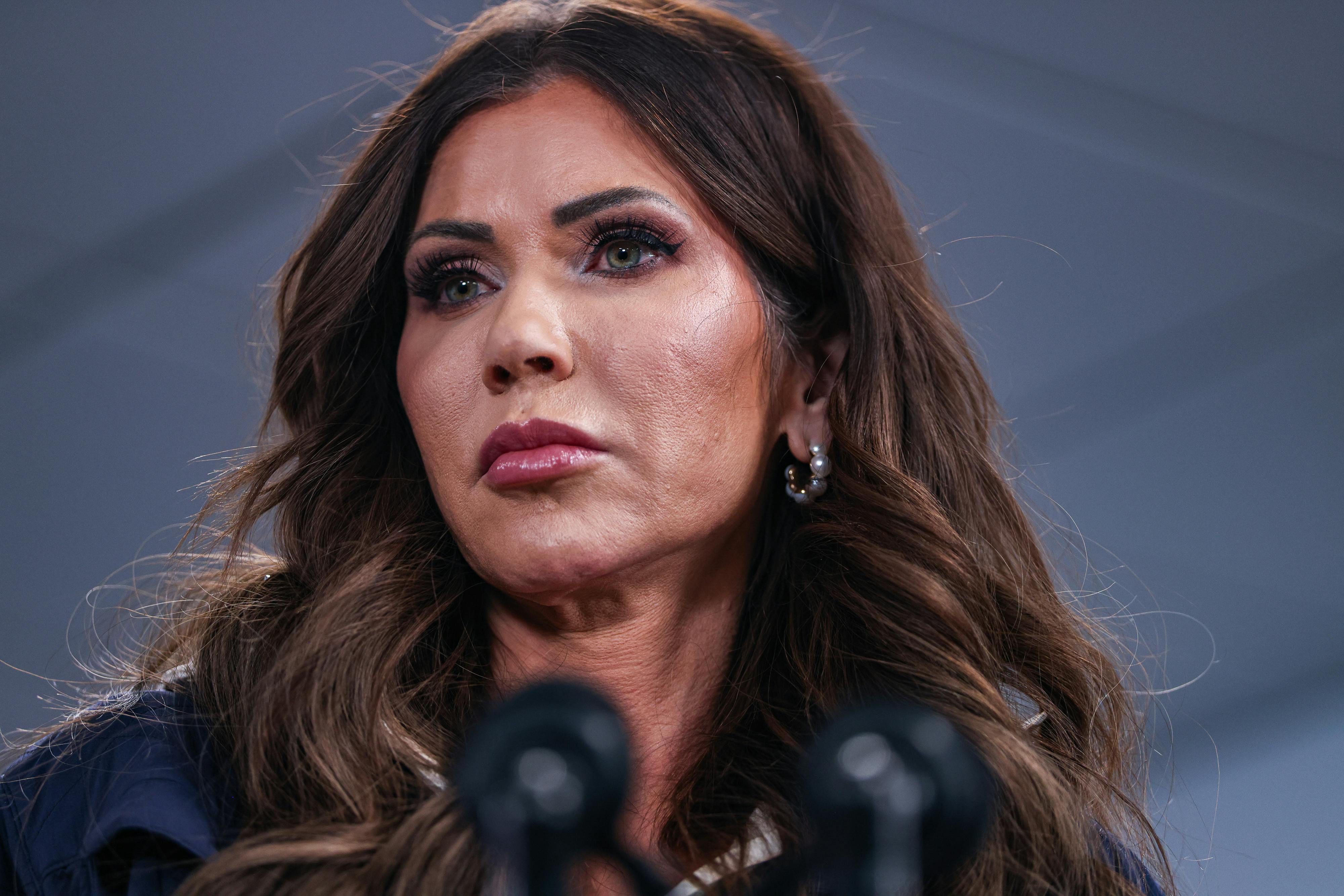 Homeland Security Secretary Kristi Noem frowns