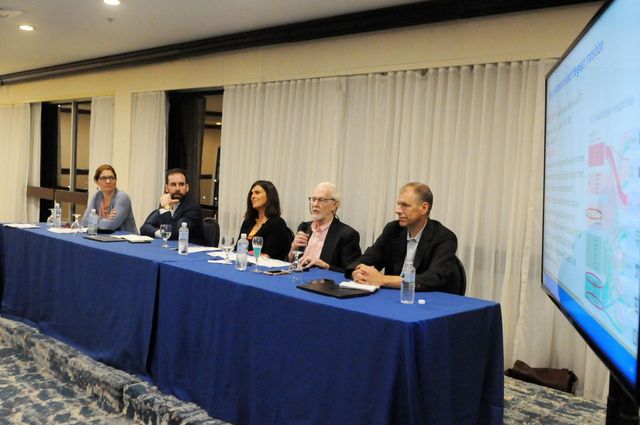 Row of panellists: 