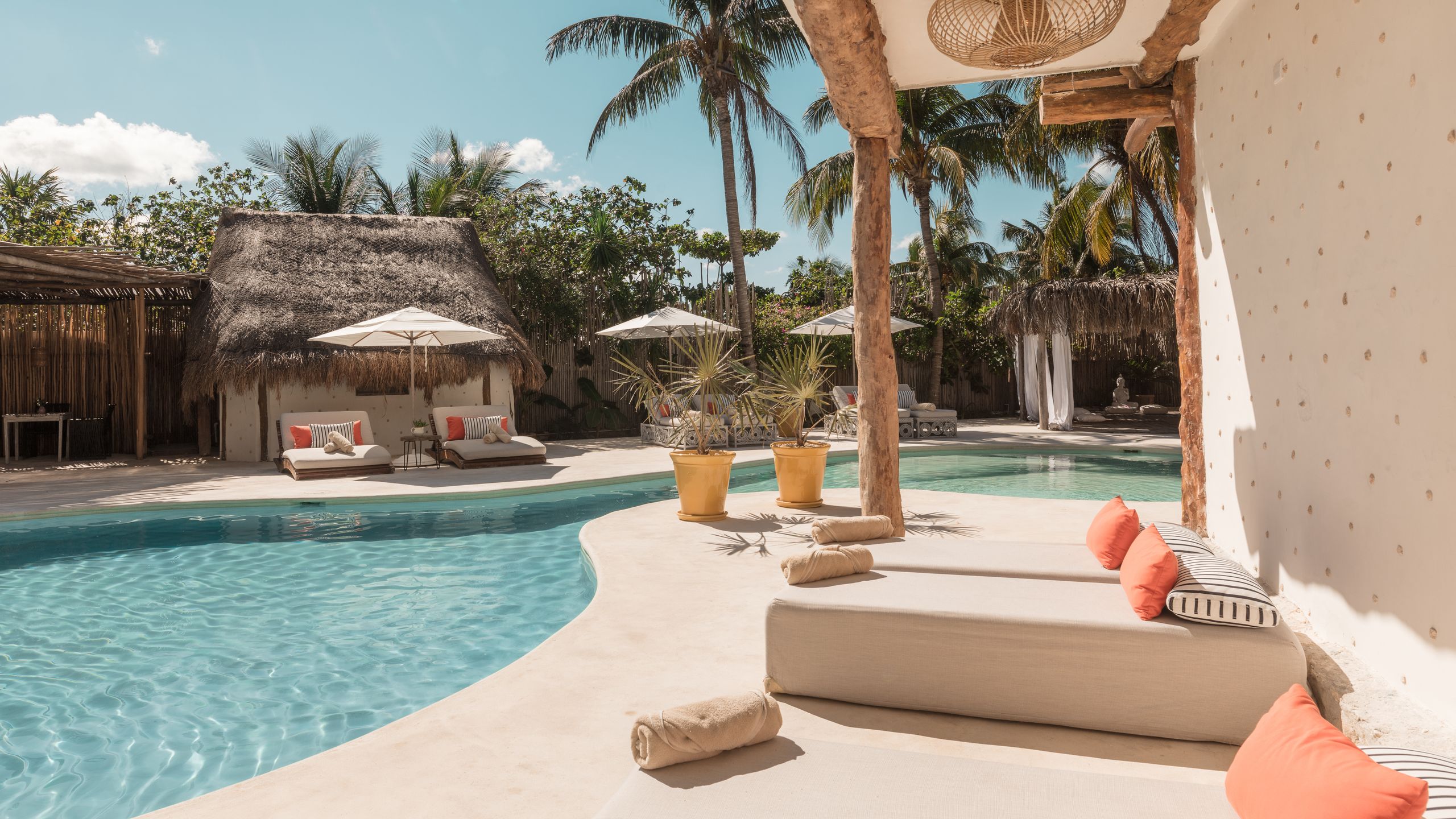 Image may contain: Pool, Water, Architecture, Building, House, Housing, Villa, Swimming Pool, Plant, Chair, and Furniture