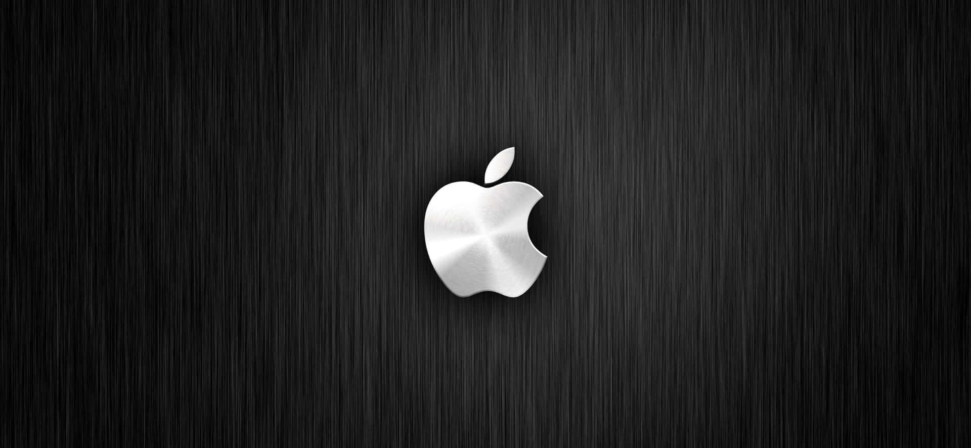 Enhisnande Flygvy Över Solnedgången Bakom En Stadssiluett. Wallpaper