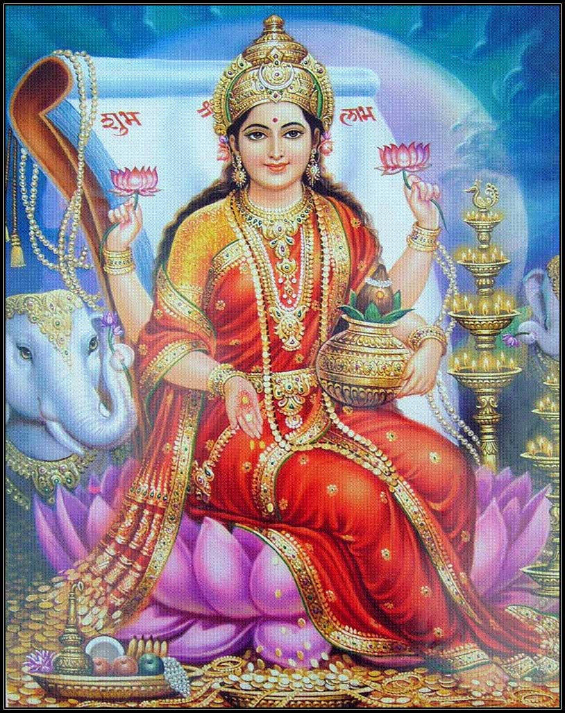 Lakshmi Devi Avec Un Livre Fond d'écran