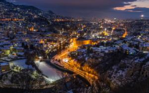 Photo representing Sarajevo and the river by night seen from the top