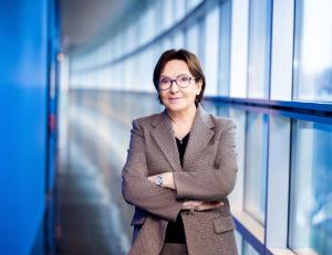 Vice-President Ewa Kopacz, Coordinator on Children’s Rights standing in a hall