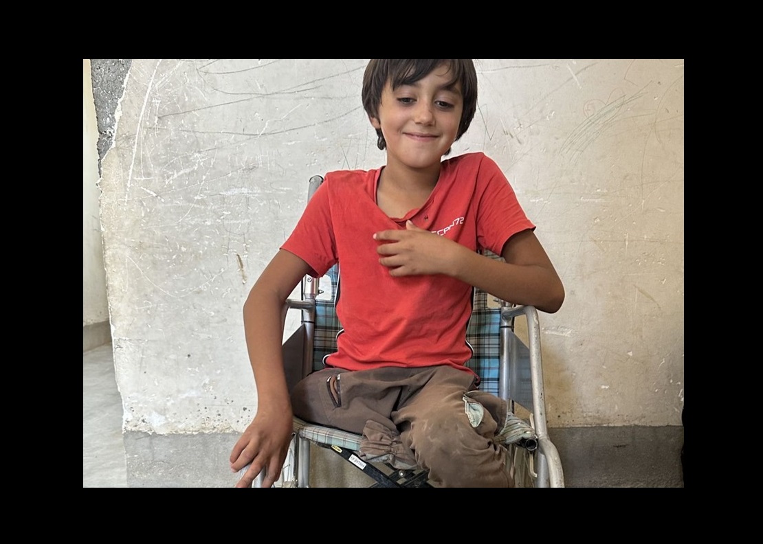 Amer at home in his wheelchair