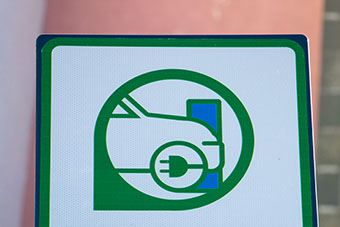 Sign showing an e-car charging point