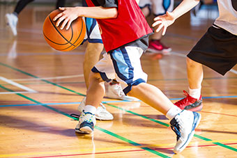 Basketball players in a basketball court