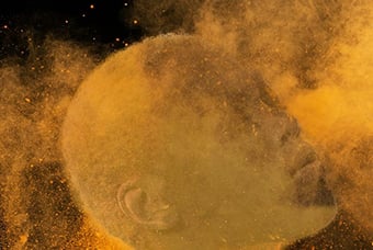 Profile covered in swirling yellow powder