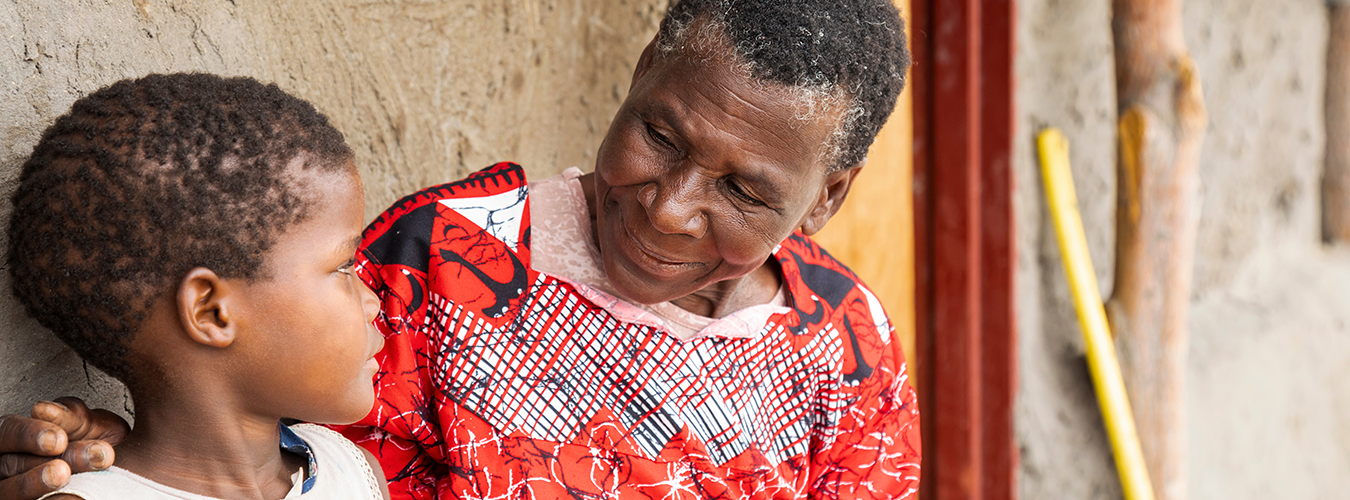 Old woman talking to her granddaughter