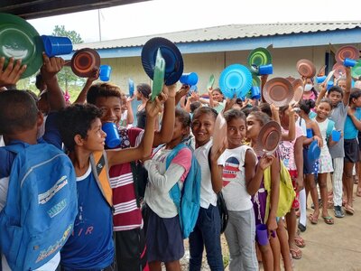 WFP/Marcela Herdocia Children line up for a school meal in Waspam, Caribbean Coast, Nicaragua.