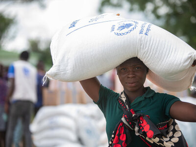 Photo: WFP/Alfredo Zuniga Beneficiary receiving food assistance in Cabo Delgado province, Mozambique