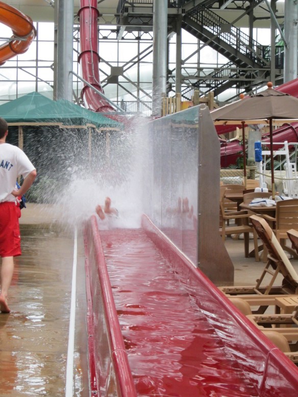Mark coming out of the red water slide