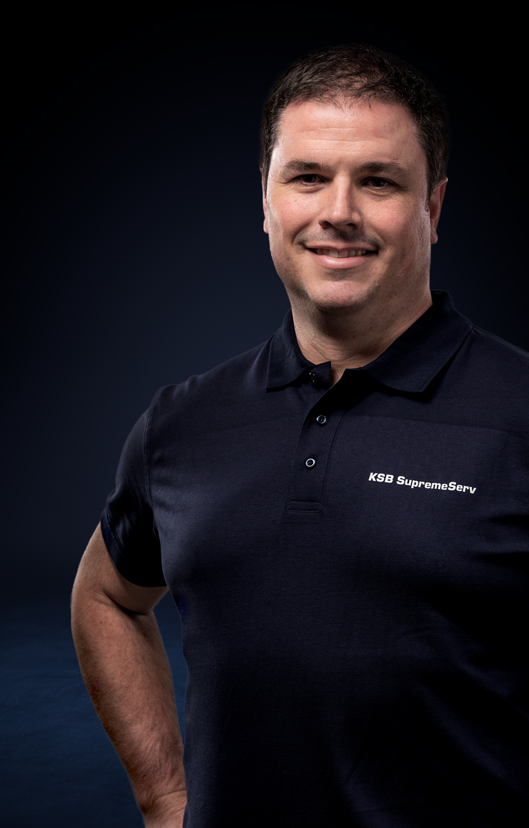KSB service engineer against a dark background