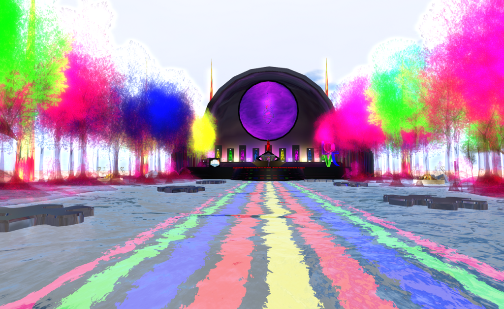 A water filled plaza fills the foreground. Large, metallic puzzle pieces float off to the sides. A Rainbow path runs away from the viewer just beneath the water's surface. At the end of the path is a large stage with a hemispherical roof. A big purple disk fills most of this roof area. Across the stage, eight giant lava lamps in assorted colours have been placed. Two either side of the view, lining the plaza are intensely bright hued trees in green, magenta, and blue.