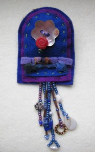 blue arch with beads