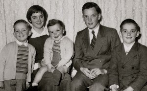 Nigel, Barbara, Angus, Clive and Graeme. Robinson Studio photo 1958 (Barbara cutting her fringe as usual before photo)