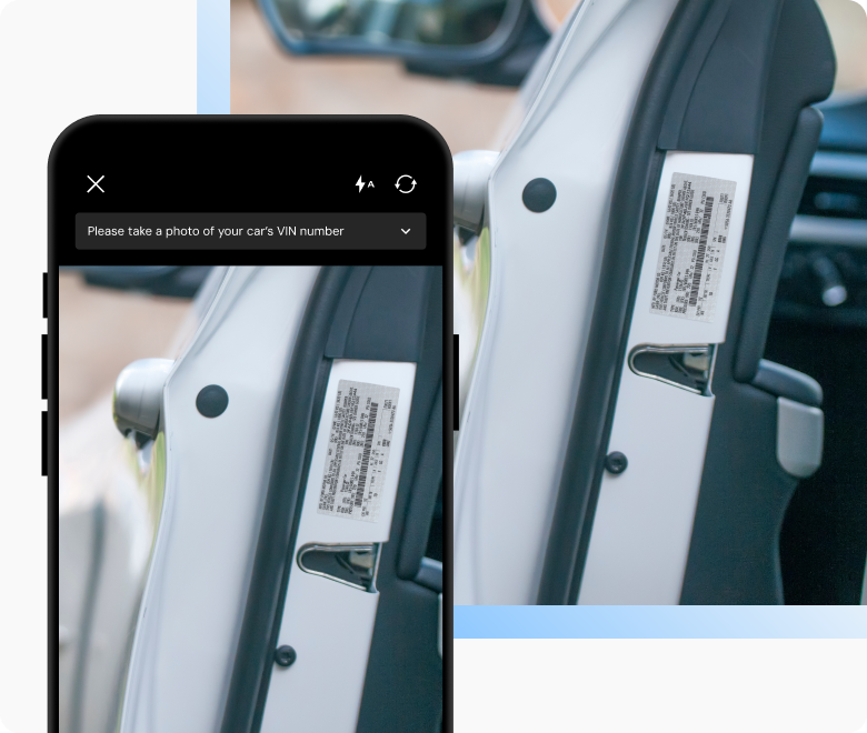 Mobile camera capturing the side of a car door with a VIN label.