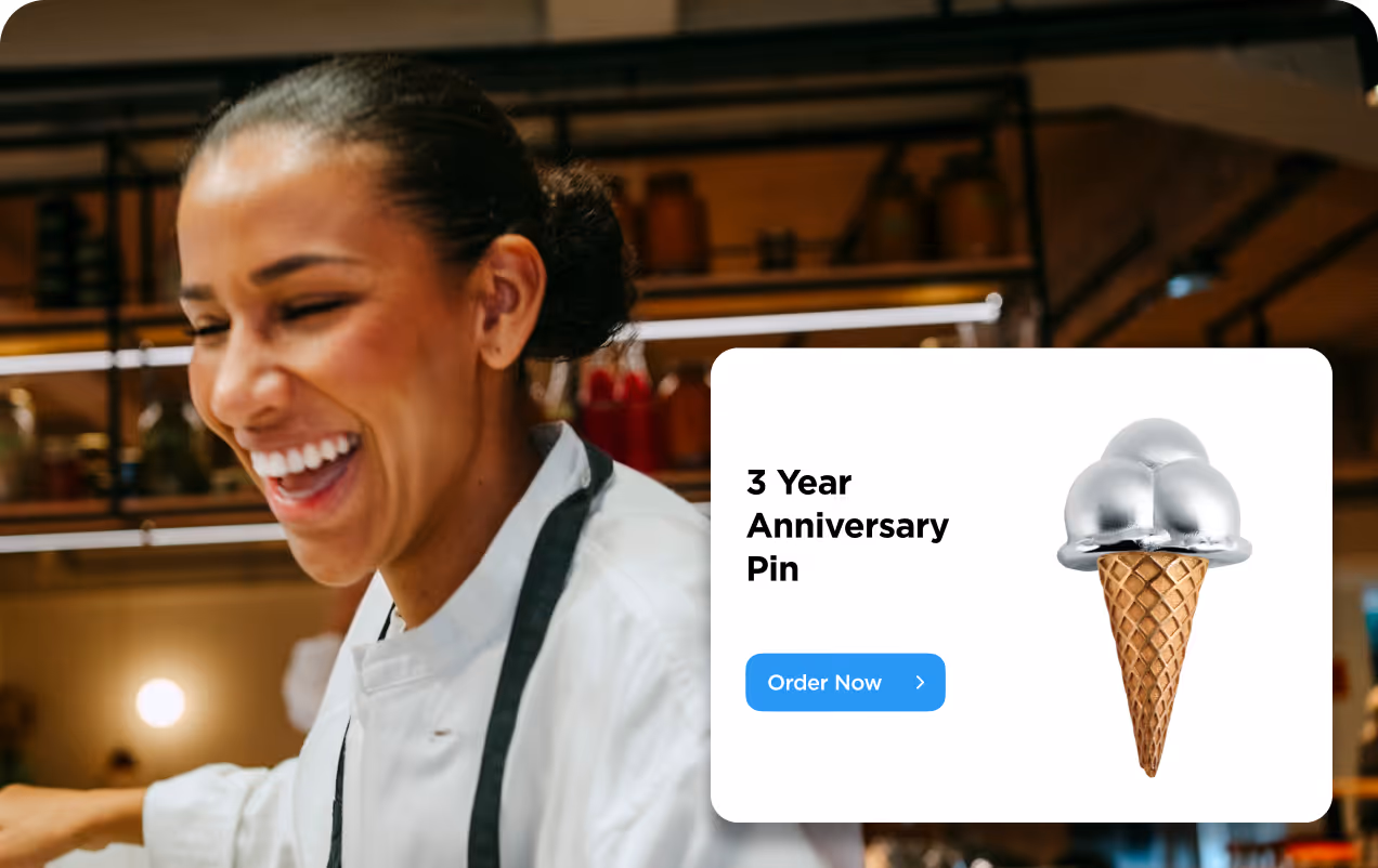 Smiling woman in a chef coat with a digital overlay showing a 3 Year Anniversary Pin shaped like an ice cream cone with a silver scoop and an 'Order Now' button.