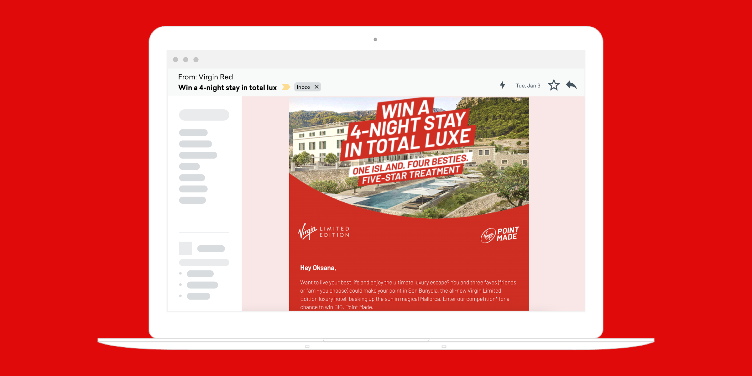 An email advertisement on a laptop screen promoting a contest to win a four-night stay at a luxury resort. The background is red, and the text highlights the prize and details of the offer.