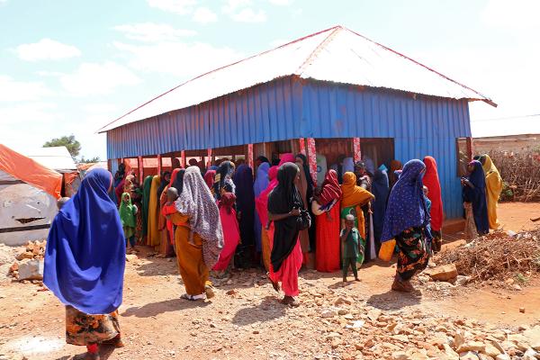View of people in front of a distribution centre