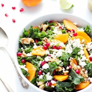 Kale Salad with Persimmon, Walnuts, Pomegranate, and Feta