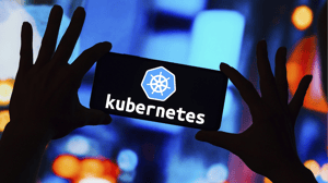 Kubernetes logo on a smartphone screen Kubernetes logo on a smartphone screen