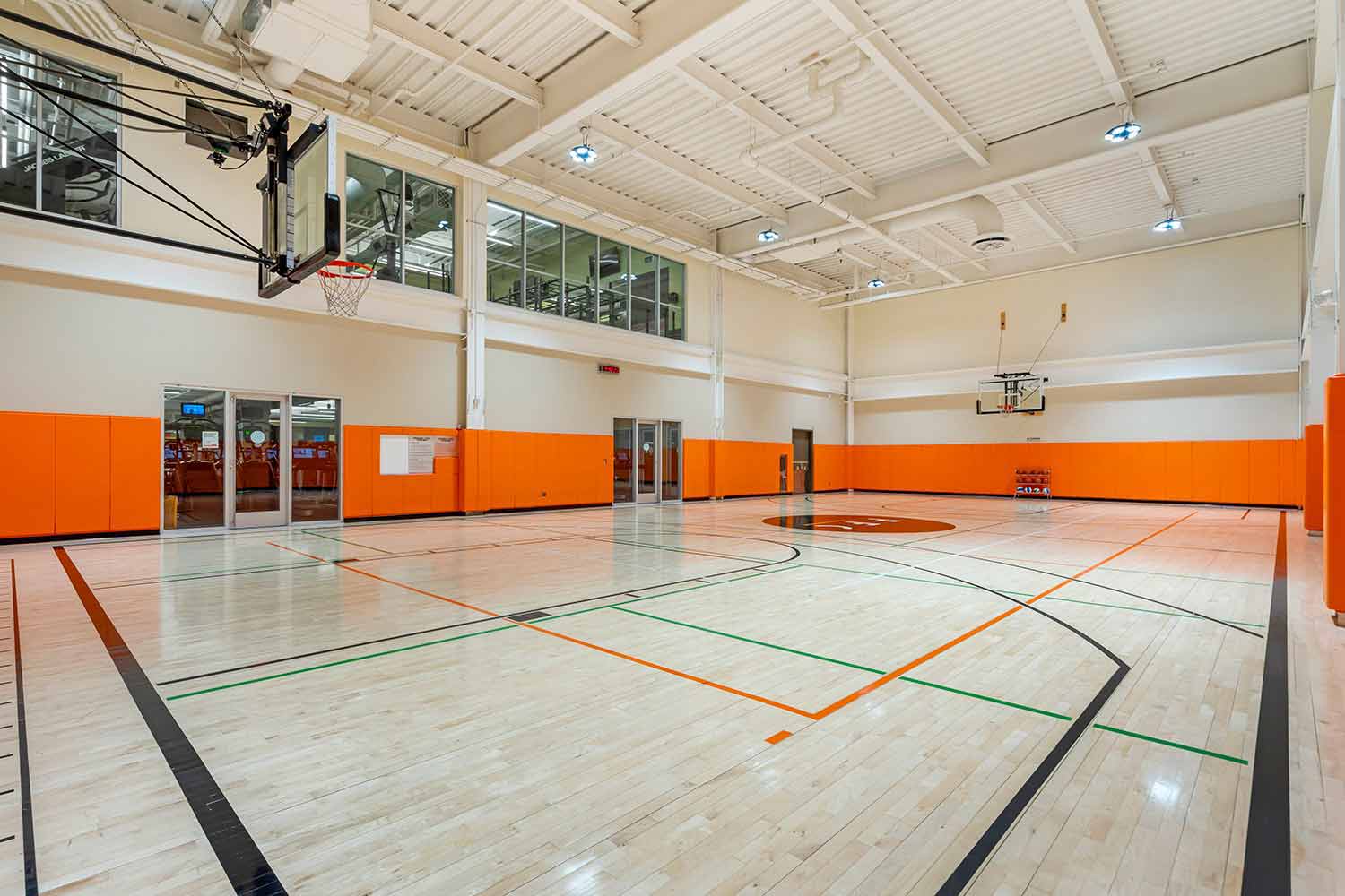 Basketball-Court Basketball court with pickleball courts inside Elmhurst Gym.