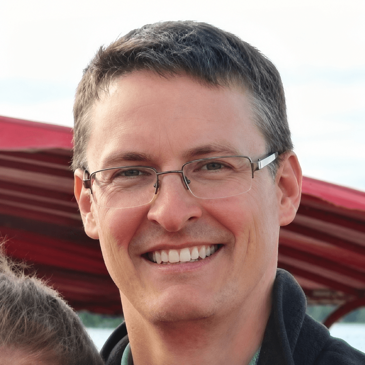 A headshot of John Lueders