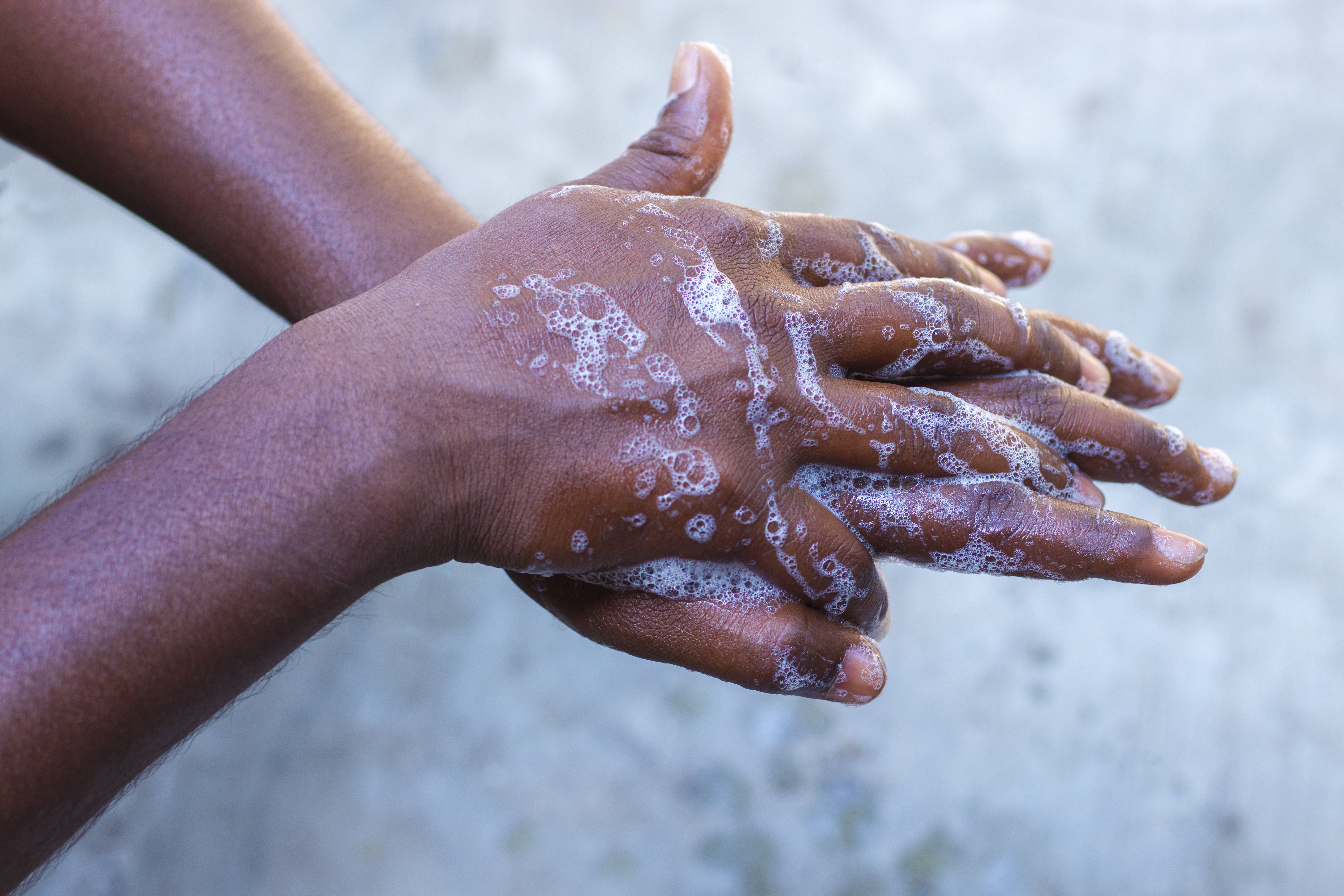 Someone washing their hands