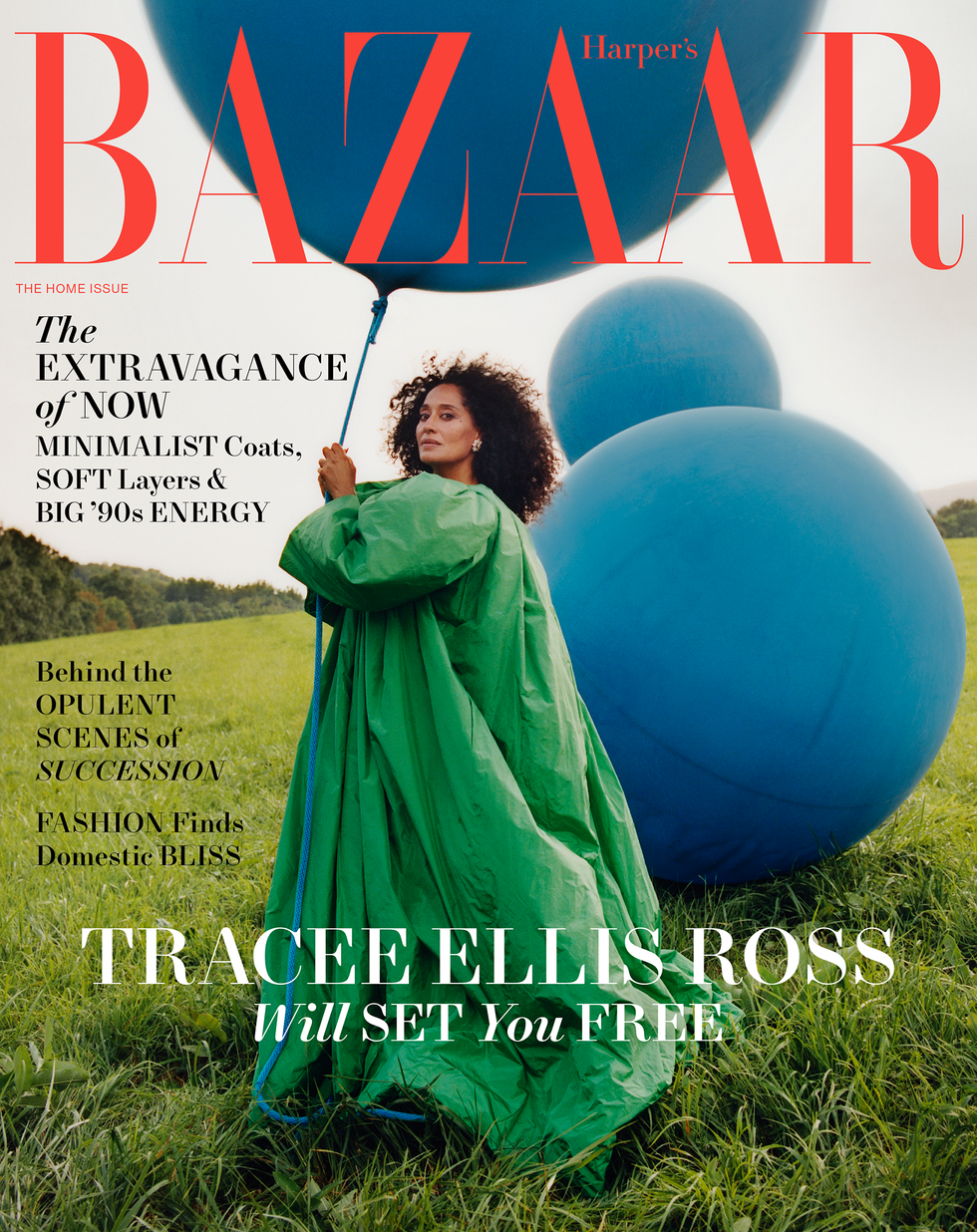 tracee ellis ross poses with a large blue balloon wearing an emerald green balenciaga couture opera coat tracee ellis ross poses with a large blue balloon wearing an emerald green balenciaga couture opera coat