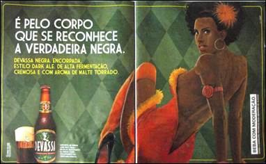 Promotional image of Devassa beer, showing a Black woman sitting with her arms resting on the ground. She has short black hair adorned with an orange flower and is wearing an orange dress with black high heels. The background is green, and next to the woman, there is a bottle and a glass of Devassa beer. The ad contains the text in Portuguese: "É pelo corpo que se reconhece a verdadeira negra." Promotional image of Devassa beer, showing a Black woman sitting with her arms resting on the ground. She has short black hair adorned with an orange flower and is wearing an orange dress with black high heels. The background is green, and next to the woman, there is a bottle and a glass of Devassa beer. The ad contains the text in Portuguese: "É pelo corpo que se reconhece a verdadeira negra."