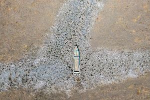 Vue aérienne d’une barque sur une zone asséchée du lac Cuitzeo, dans l’État de Michoacan, au Mexique, le 3 mars 2024.
