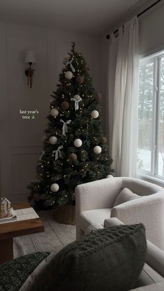 a living room with a christmas tree in the corner