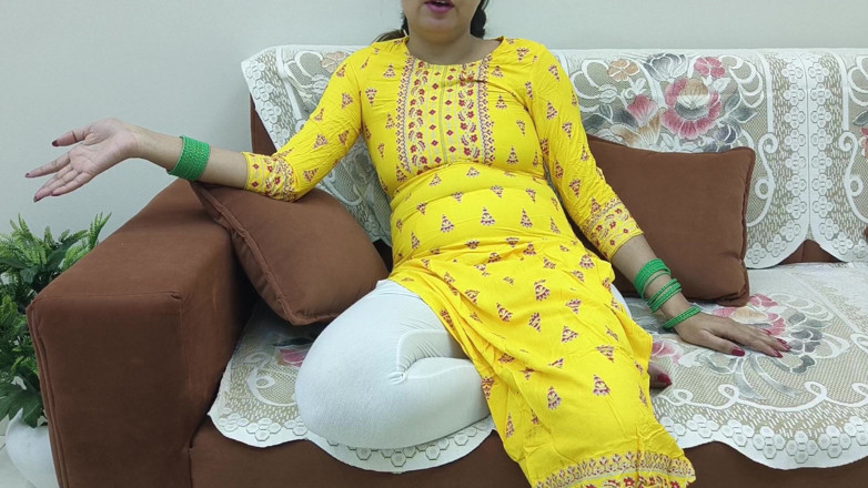 Saarabhabhi6: Indian Desi Woman in a Sari on a Couch Showing...