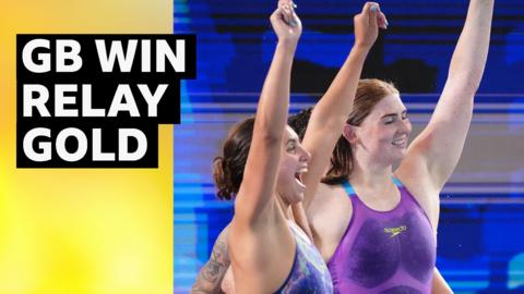 Great Britain's swimmers celebrate winning gold
