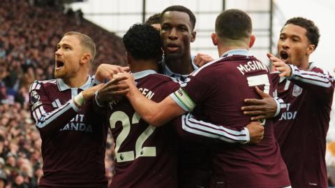 Aston Villa players celebrate Nicolas Jackson's first goal against Manchester City