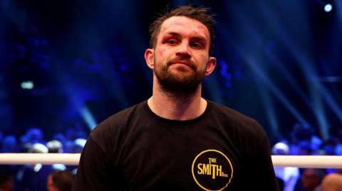 British boxer Paul Smith pictured in a T-shirt in a boxing ring