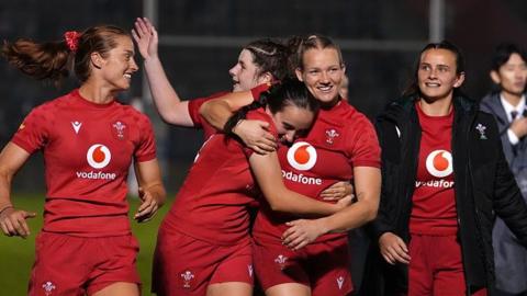 Wales celebrate their 17-0 victory over Japan
