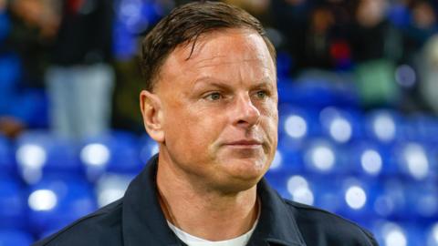 Leyton Orient boss Richie Wellens in a dark top